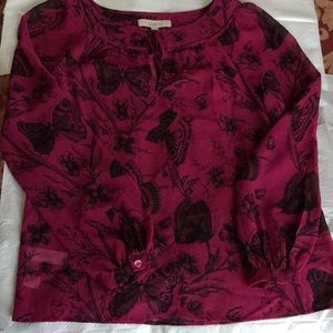 Long sleeve top, dark pink color with black print